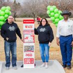Denton unveils first defibrillator in memory of Guyer runner